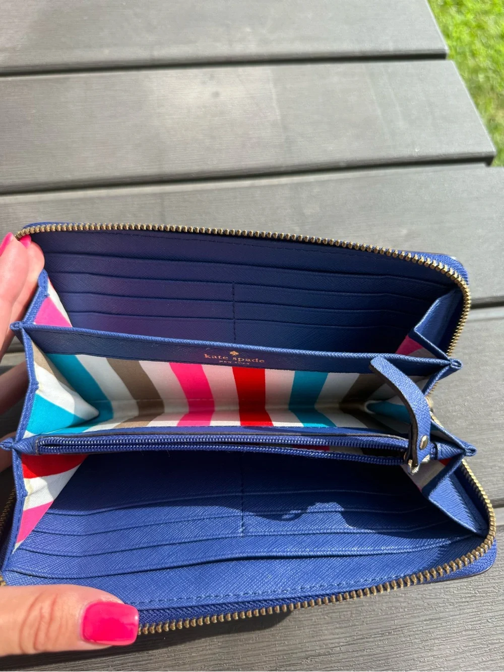 kate spade zip-around wallet in cobalt blue